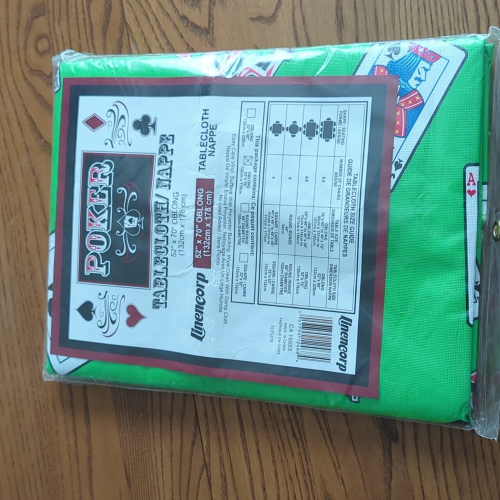 Linencorp vinyl table Cloth. Poker Theme. oblong 52x70 inches.  Still in package